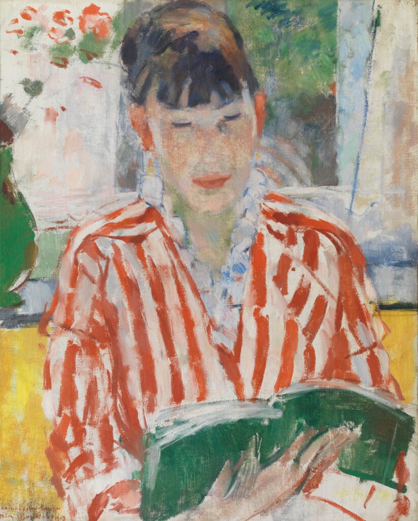 A painting of a short, black haired woman with a red and white shirt on reading a green book. Art is Woman Reading by Rik Wouters.